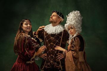 Image showing Medieval young man and women in old-fashioned costume