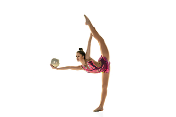 Image showing Young flexible female gymnast isolated on white studio background