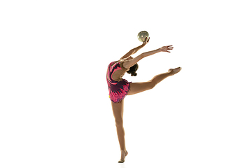 Image showing Young flexible female gymnast isolated on white studio background