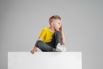 Image showing Happy boy isolated on white studio background. Looks happy, cheerful, sincere. Copyspace. Childhood, education, emotions concept