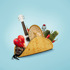 Image showing Fresh and tasty taco filled with Sombrero, Ukulele, Maracas, cactus, drink on blue background.