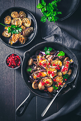 Image showing Baked small eggplants, stuffed with mushrooms and pomegranate