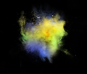 Image showing Explosion of colored, fluid and neoned powder on black studio background with copyspace