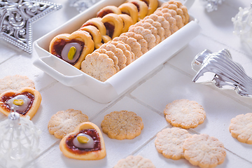 Image showing Homemade Christmas cookies with ornaments in white