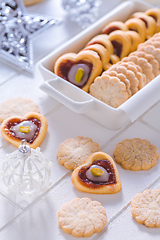 Image showing Homemade Christmas cookies with ornaments in white