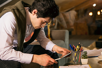 Image showing Close up manager working in modern office using devices and gadgets during creative meeting