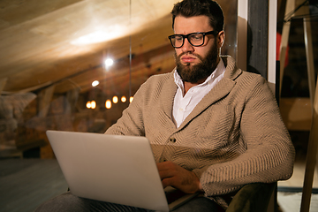 Image showing Close up manager working in modern office using devices and gadgets during creative meeting