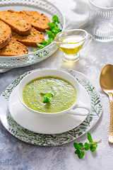 Image showing Homemade zucchini soup with tomato ciabatta bread and herbs