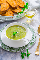 Image showing Homemade zucchini soup with tomato ciabatta bread and herbs