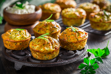 Image showing Homemade zucchini muffins with feta cheese and herbs
