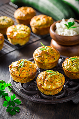 Image showing Homemade zucchini muffins with feta cheese and herbs