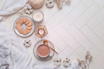 Image showing Autumn and winter still life with hot chocolate and cocoa, cookies, candles