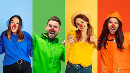 Image showing Portrait of young people celebrating red nose day on colorful background