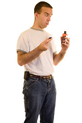 Image showing Man Taking Medicine