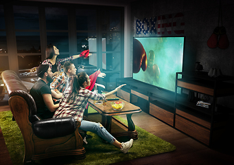 Image showing Group of friends watching TV, boxing match in USA, sport games