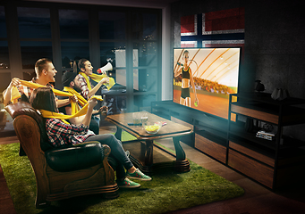 Image showing Group of friends watching TV, tennis match in Norway, sport games
