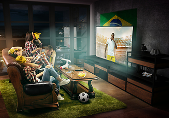Image showing Group of friends watching TV, football match in Brazil, sport games