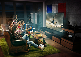 Image showing Group of friends watching TV, match, sport games, football fans in France
