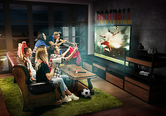 Image showing Group of friends watching TV, football match in Germany, sport games