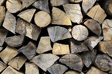 Image showing Firewood pile stacked chopped wood trunks