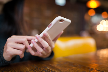 Image showing Woman use of mobile phone in coffee shop