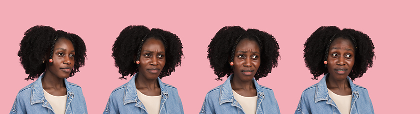 Image showing African-american woman portrait isolated on pink studio background with copyspace