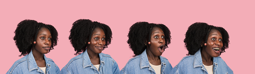 Image showing African-american woman portrait isolated on pink studio background with copyspace