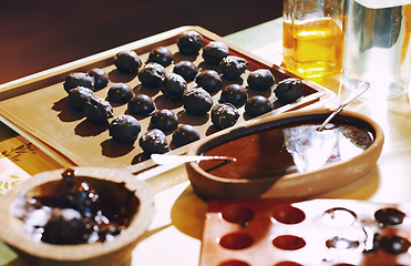 Image showing Homemade organic vegetarian chocolates on a table