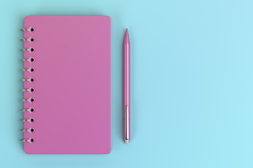 Image showing Pink notebook and pen