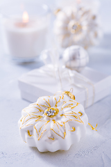 Image showing Christmas ornaments and small present in white