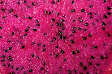 Image showing Background dragon fruit slice ripe wet pitahaya cut