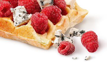 Image showing Closeup french waffles with raspberries and dorblu