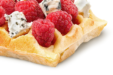 Image showing Closeup of french waffles with raspberries and dorblu cheese