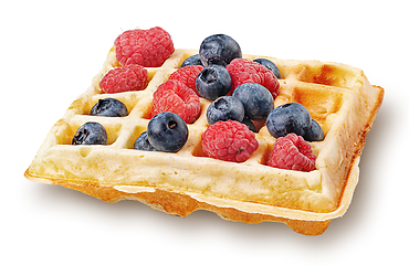 Image showing French waffle with berries isolated on white