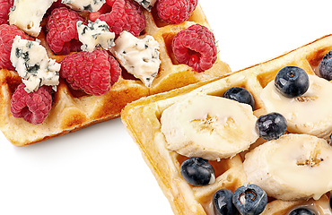 Image showing French waffles with berries, bananas and dorblu cheese isolated