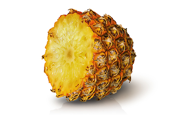 Image showing Half of pineapple rotated isolated on white