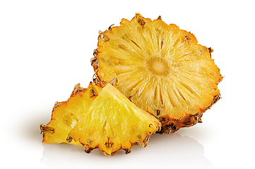 Image showing Half pineapple and slices isolated on white