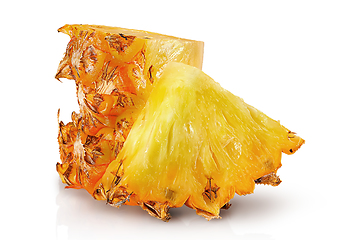 Image showing Several slices of pineapple in stack and one near