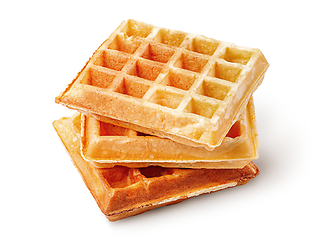 Image showing Three crispy fried french waffles isolated on white