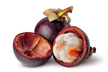 Image showing Whole and opened mangosteen with shells isolated on white