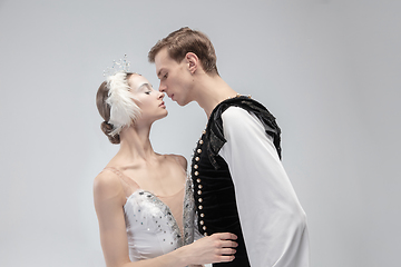 Image showing Young graceful couple of ballet dancers on white studio background