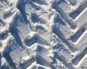 Image showing Traces of the car on the snow