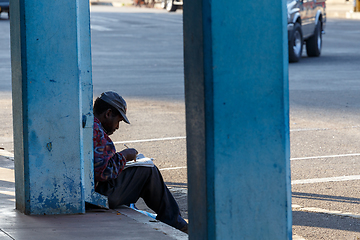 Image showing Man resting on street in Bulawayo City, Zimbabwe