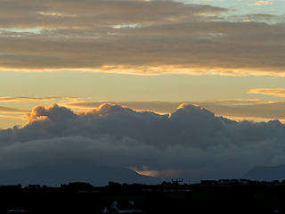 Image showing Heavy Clouds over Snowdonia Mountains at Dawn 