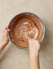 Image showing process of making dough for chocolate cake