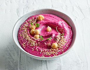 Image showing bowl of beetroot hummus