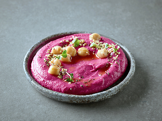 Image showing plate of beetroot hummus