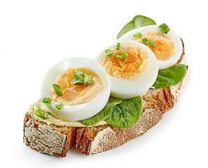 Image showing breakfast sandwich with boiled egg