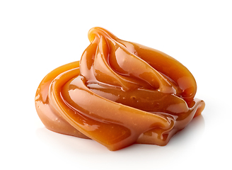 Image showing melted caramel on white background