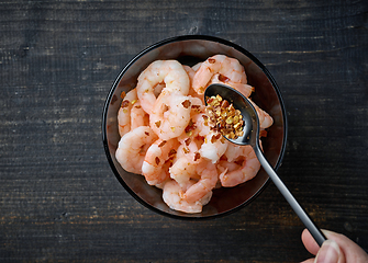 Image showing bowl of prawns and chili flakes